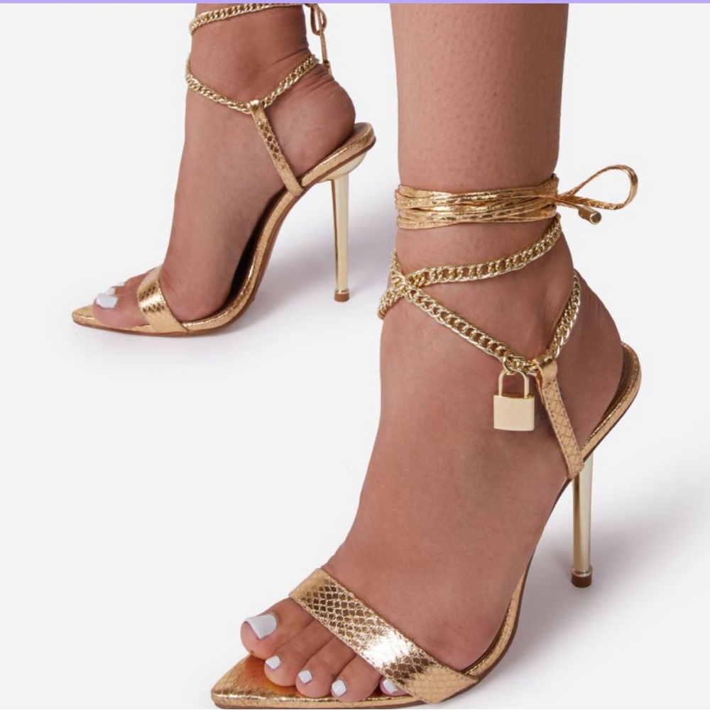 CHAIN PADLOCK DETAIL LACE UP POINTED TOE HEEL IN GOLD SNAKE PRINT FAUX LEATHER